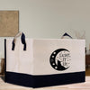 a white bag with a black and white design on it