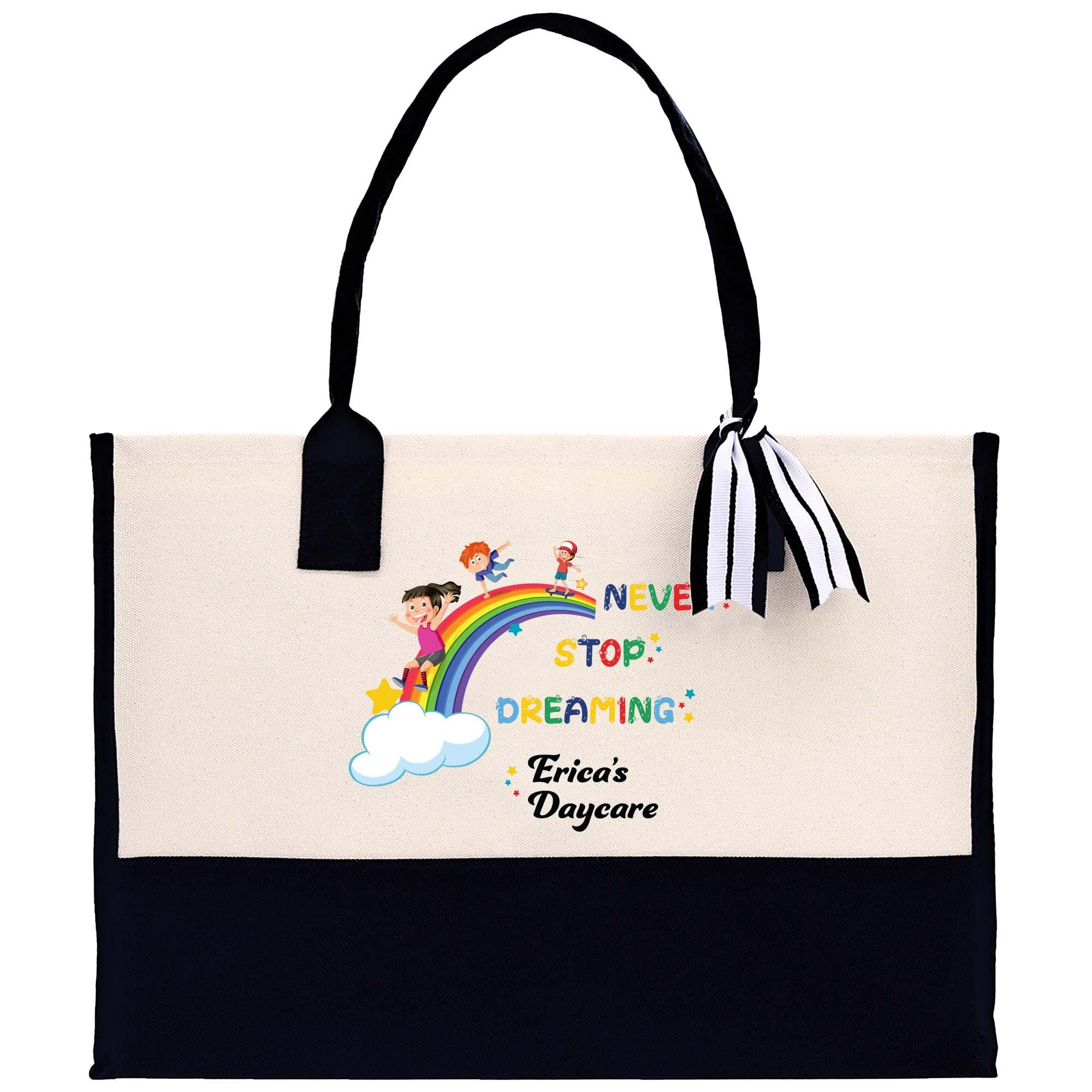 a white and black bag with a rainbow on it