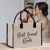 a woman kissing a woman's face while holding a shopping bag