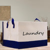 a laundry bag sitting on top of a wooden table