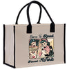 a bag with a picture of a woman reading a book