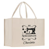 a white shopping bag with a sewing machine on it