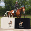 A woman is riding a brown horse in a field, with two bags featuring the same image of a woman riding a horse in the foreground.