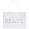 A white tote bag with the word "BRAUT" printed on it in large letters.