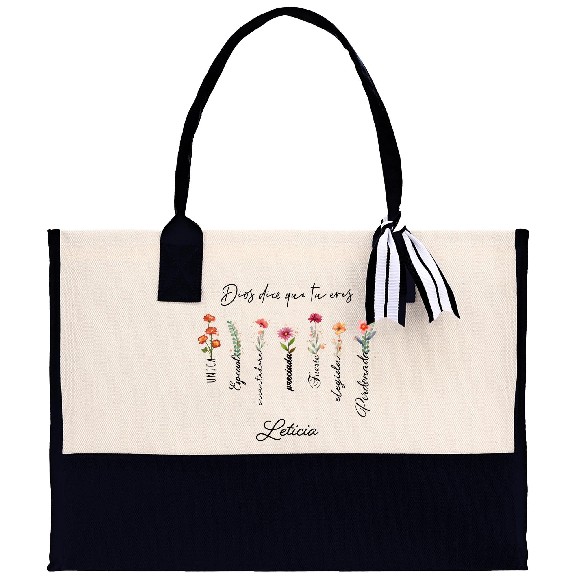 a black and white bag with flowers on it