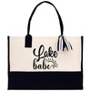 A black and white tote bag with the text 