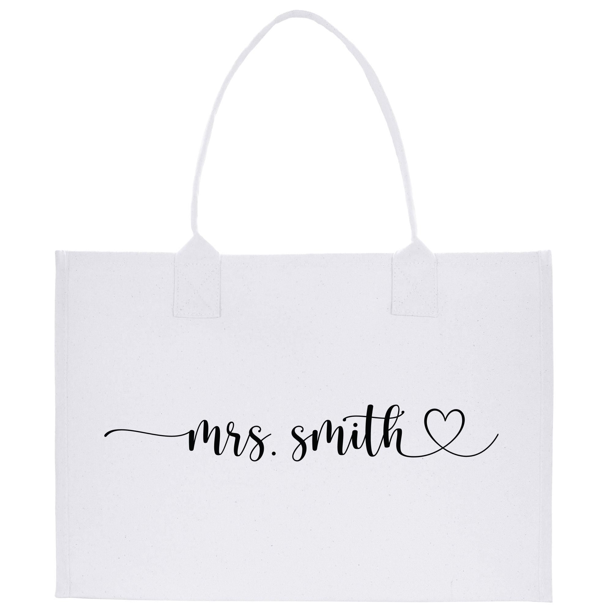 a white bag with the word mrs smith on it