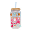 a glass cup with a straw in it