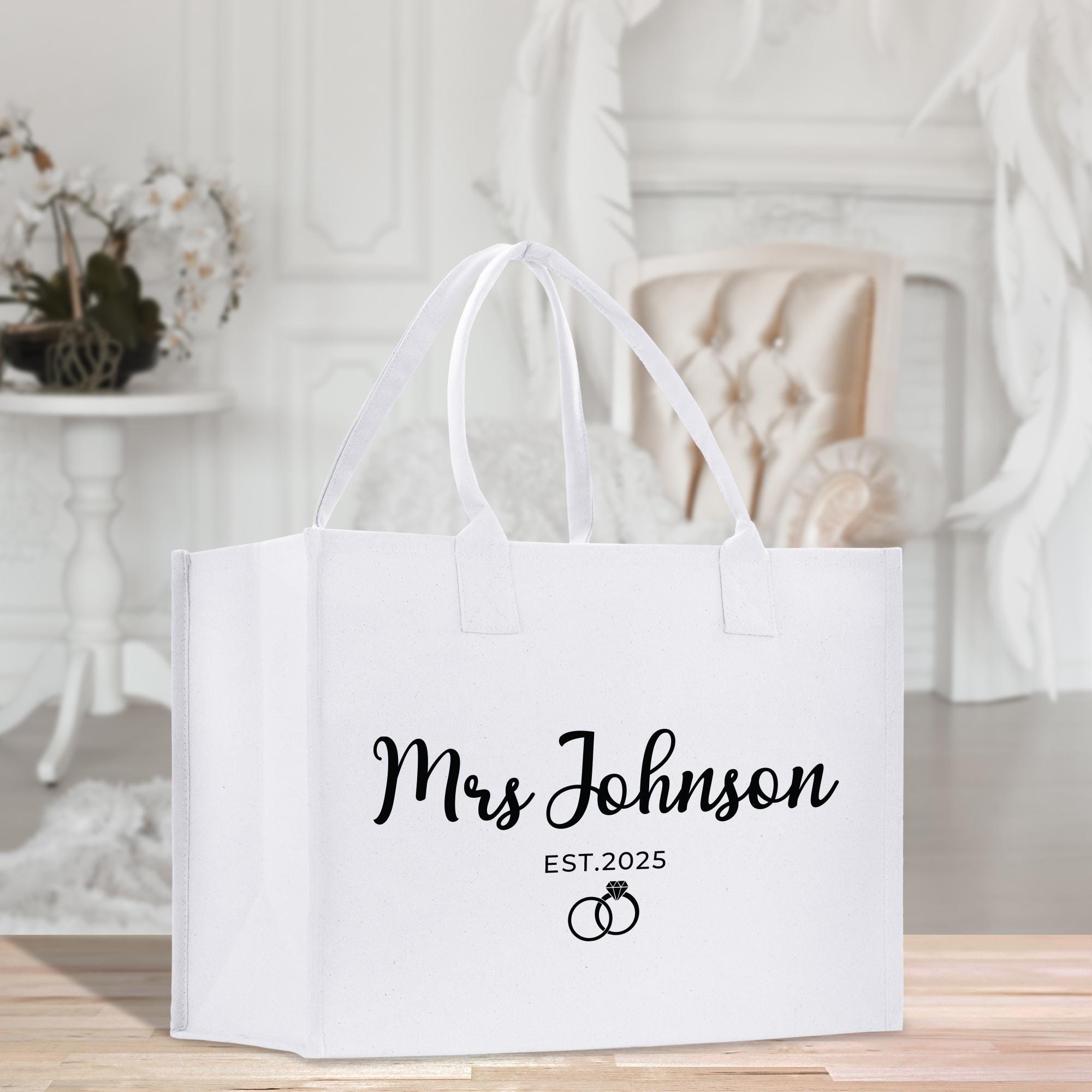 a white bag sitting on top of a wooden table