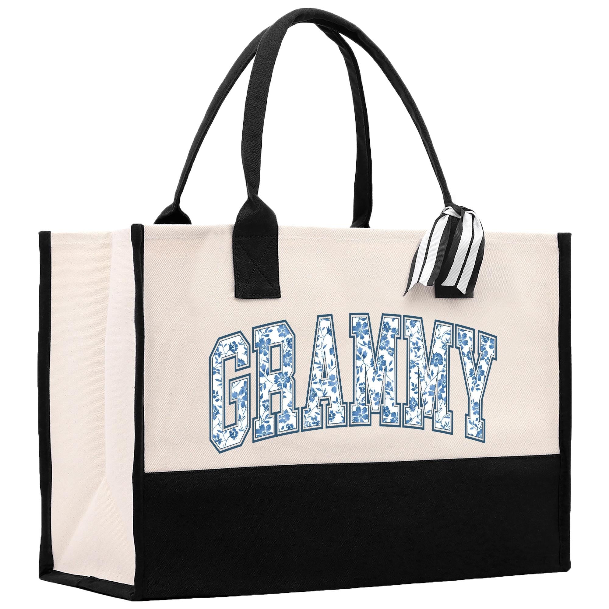 a black and white tote bag with the word gamly printed on it