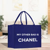 a blue bag that says, my other bag is chanel