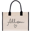 a white bag with a black handle and a name on it