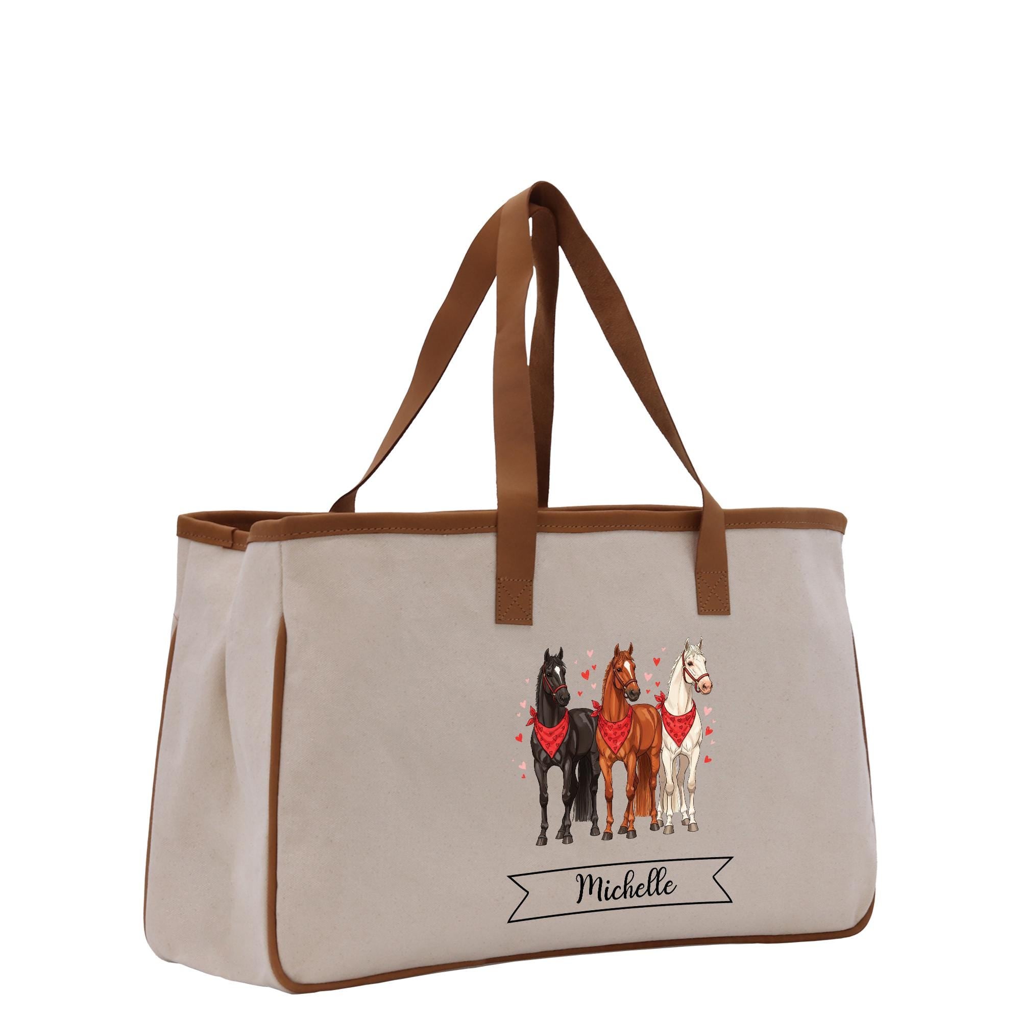 a canvas tote bag with three horses on it