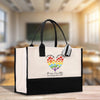 a black and white bag with a rainbow heart on it