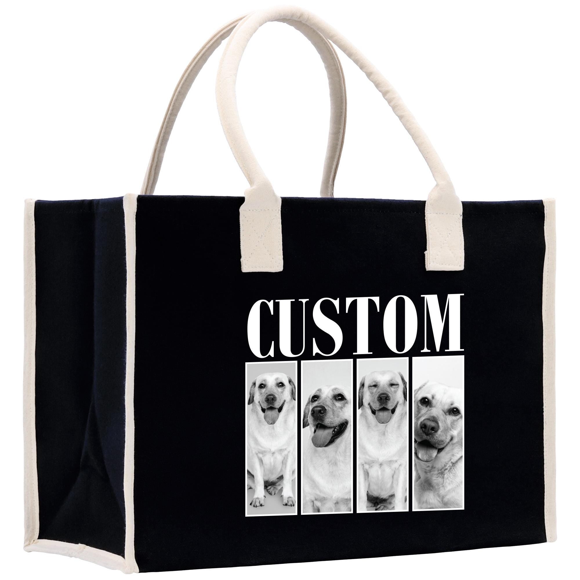 The image is a black tote bag with a white handle and a white trim. It has a custom text printed on it, which reads &quot;CUSTOM&quot;. The bag also features a collage of four black and white photographs of dogs, each with a different expression.