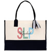 a black and white bag with a striped handle
