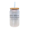 a glass jar with a straw in it