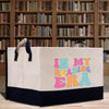 a paper bag that says i'm my reading era on it