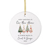 A white Christmas ornament with a gold chain hanging from it. The ornament features a festive design of four Christmas trees with ornaments and a ribbon. The text on the ornament reads "First Christmas in Our New Home 68 North Main St. Carol & George 2015".