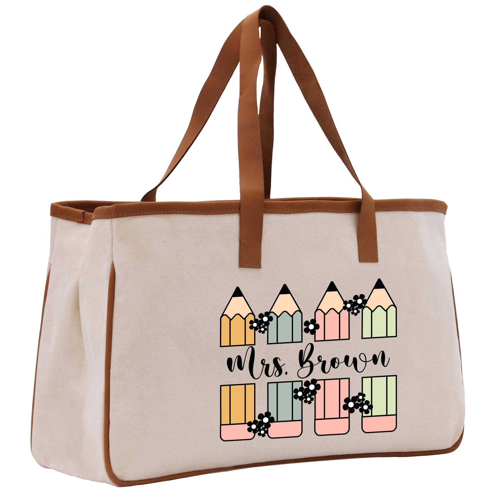 a canvas bag with a picture of a row of pencils on it