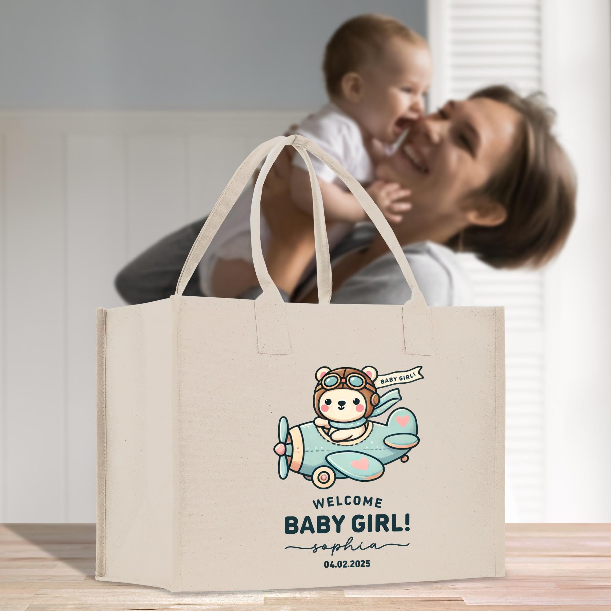 a woman kissing a baby on the cheek