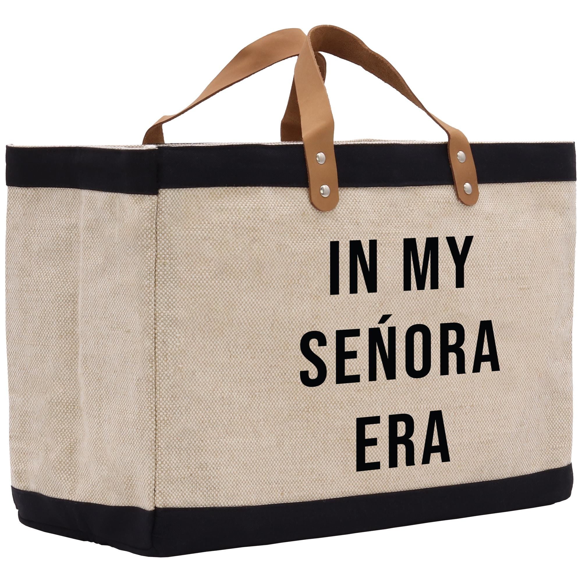 a canvas tote bag with the words in my senior era printed on it
