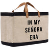 a canvas tote bag with the words in my senior era printed on it