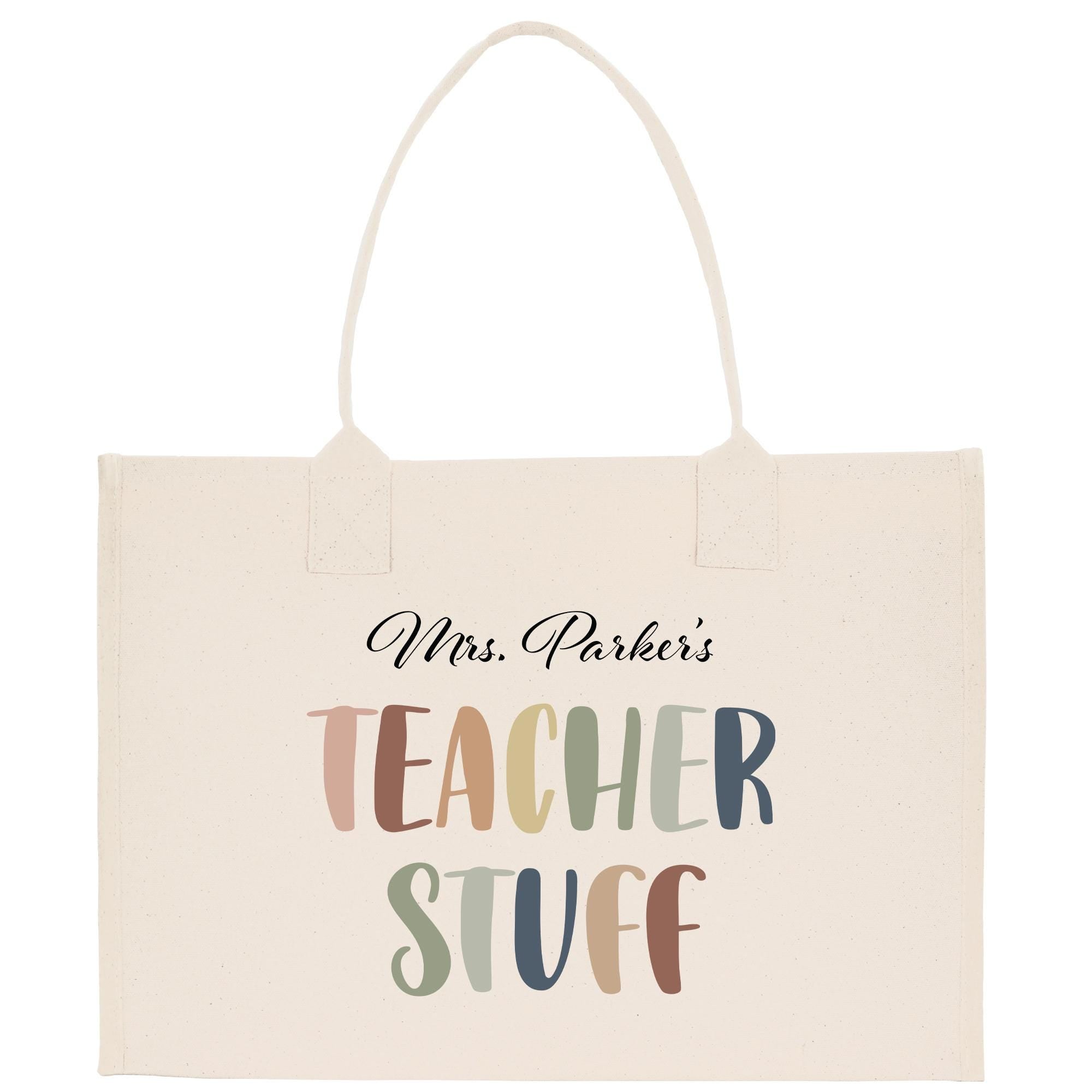 A beige tote bag with the text &quot;Mrs. Parker&#39;s Teacher Stuff&quot; printed on it.