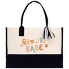 A beige tote bag with a black handle and a black and white striped ribbon tied around it. The bag has a printed design on it that says "GROovy BABE".