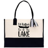 A tote bag with a black and white design, featuring the text 