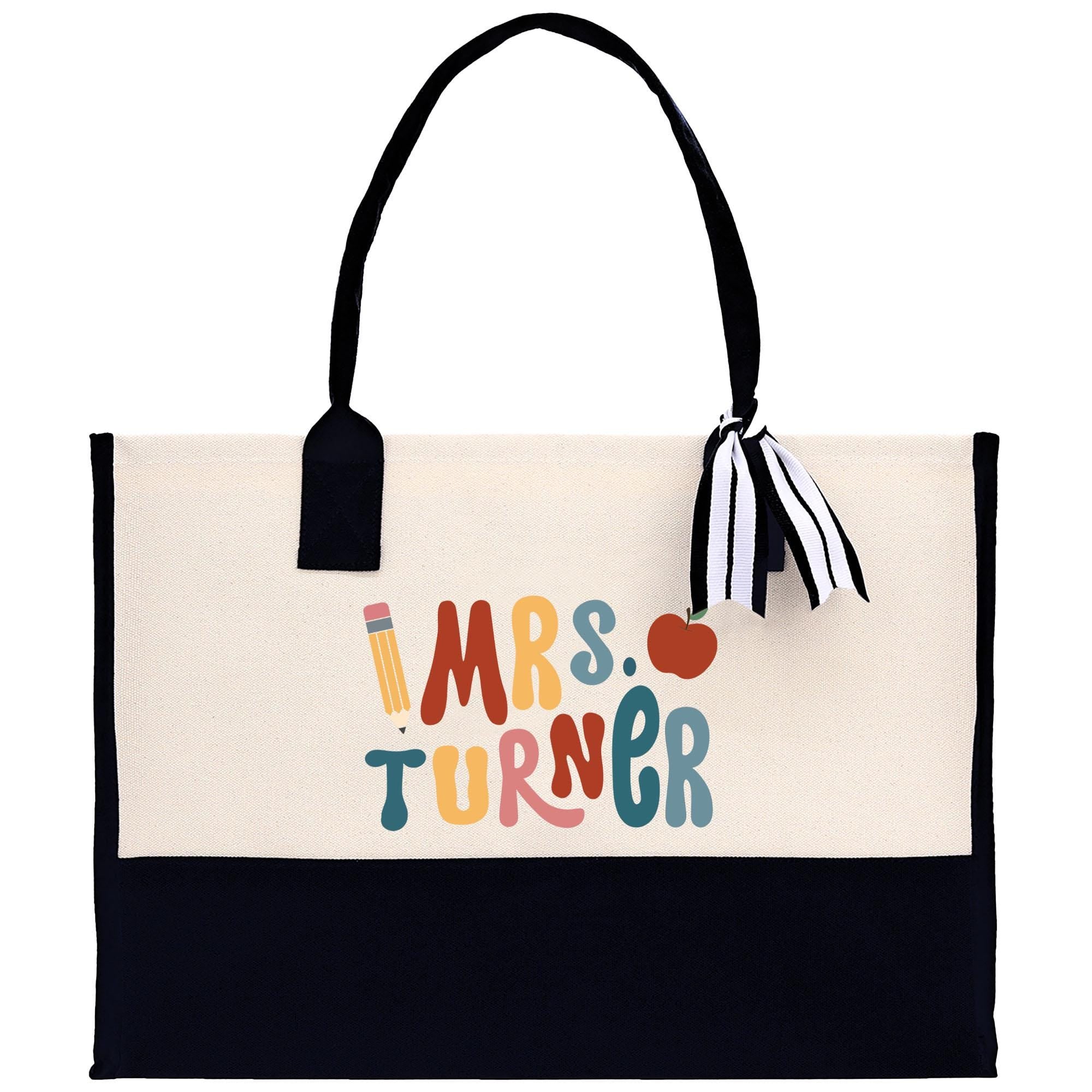 a white and black bag with a black handle