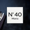 a table with a napkin, fork and knife on it