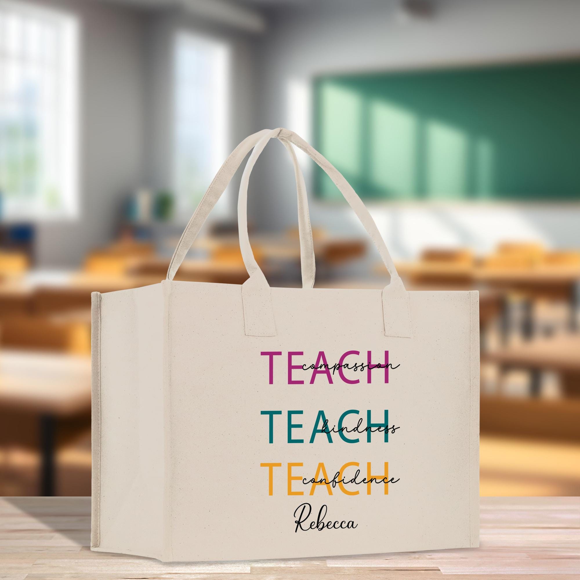 a white bag that says teach teach on it