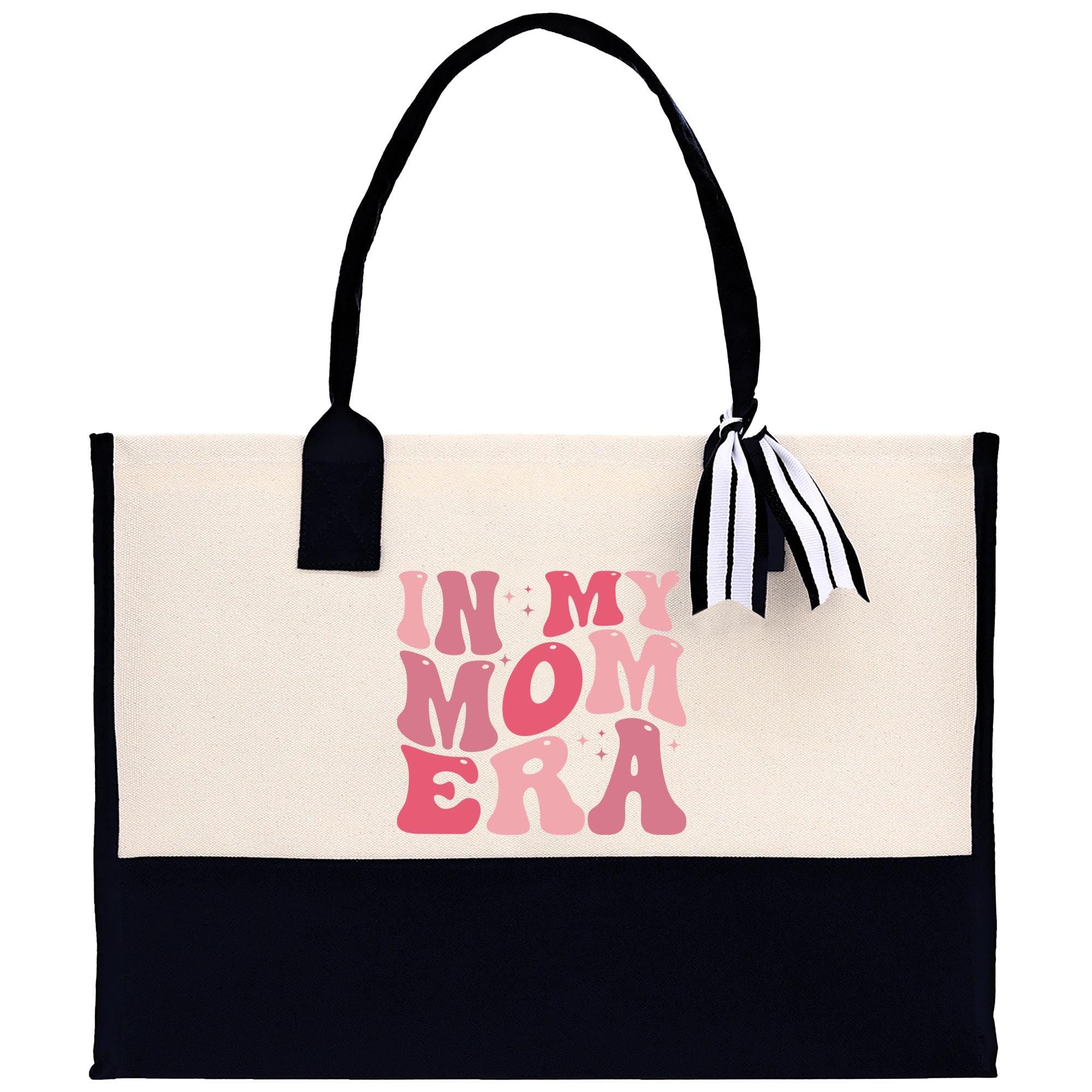 a white and black bag with a black handle