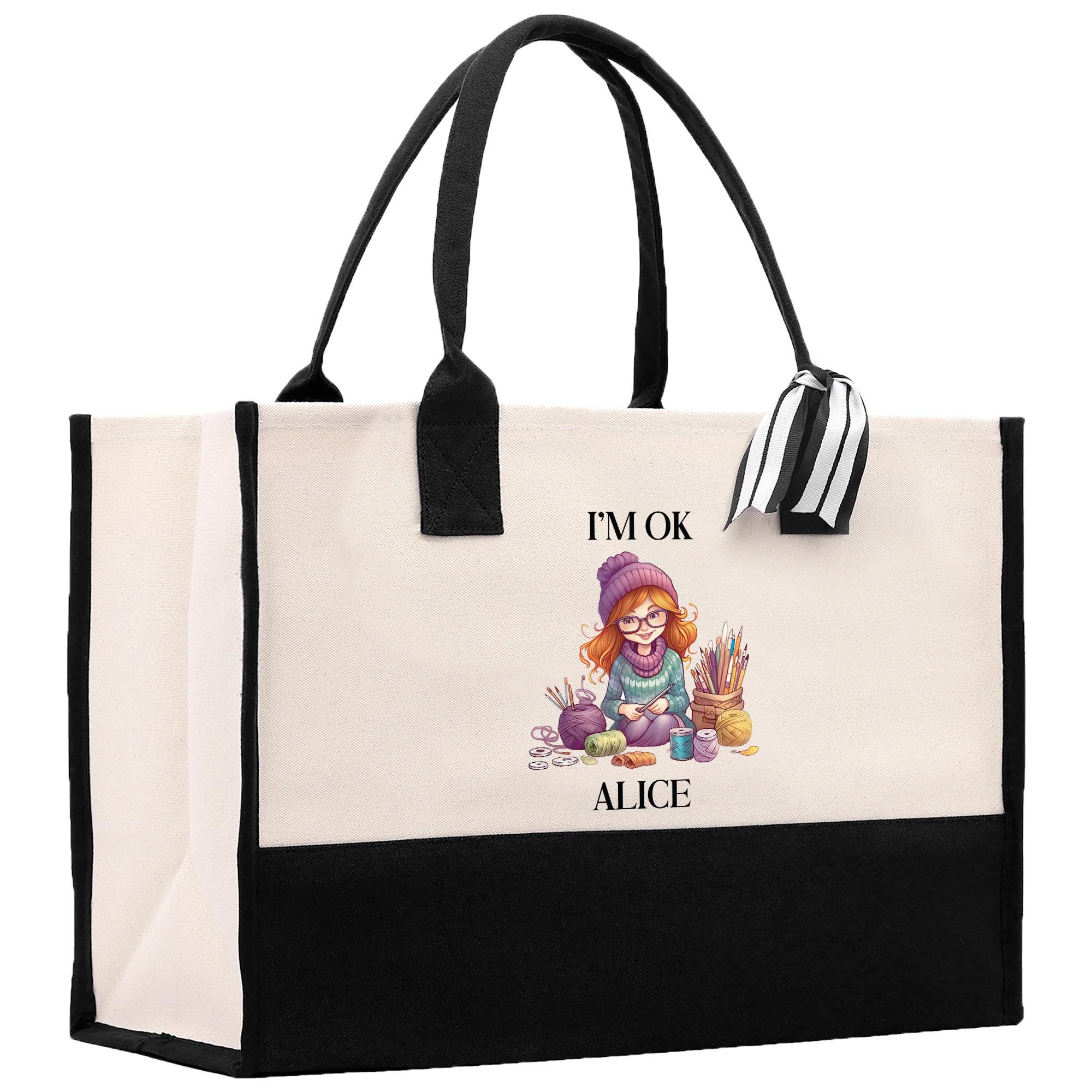 a black and white tote bag with a picture of a little girl
