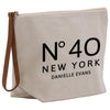 a canvas bag with a brown leather strap