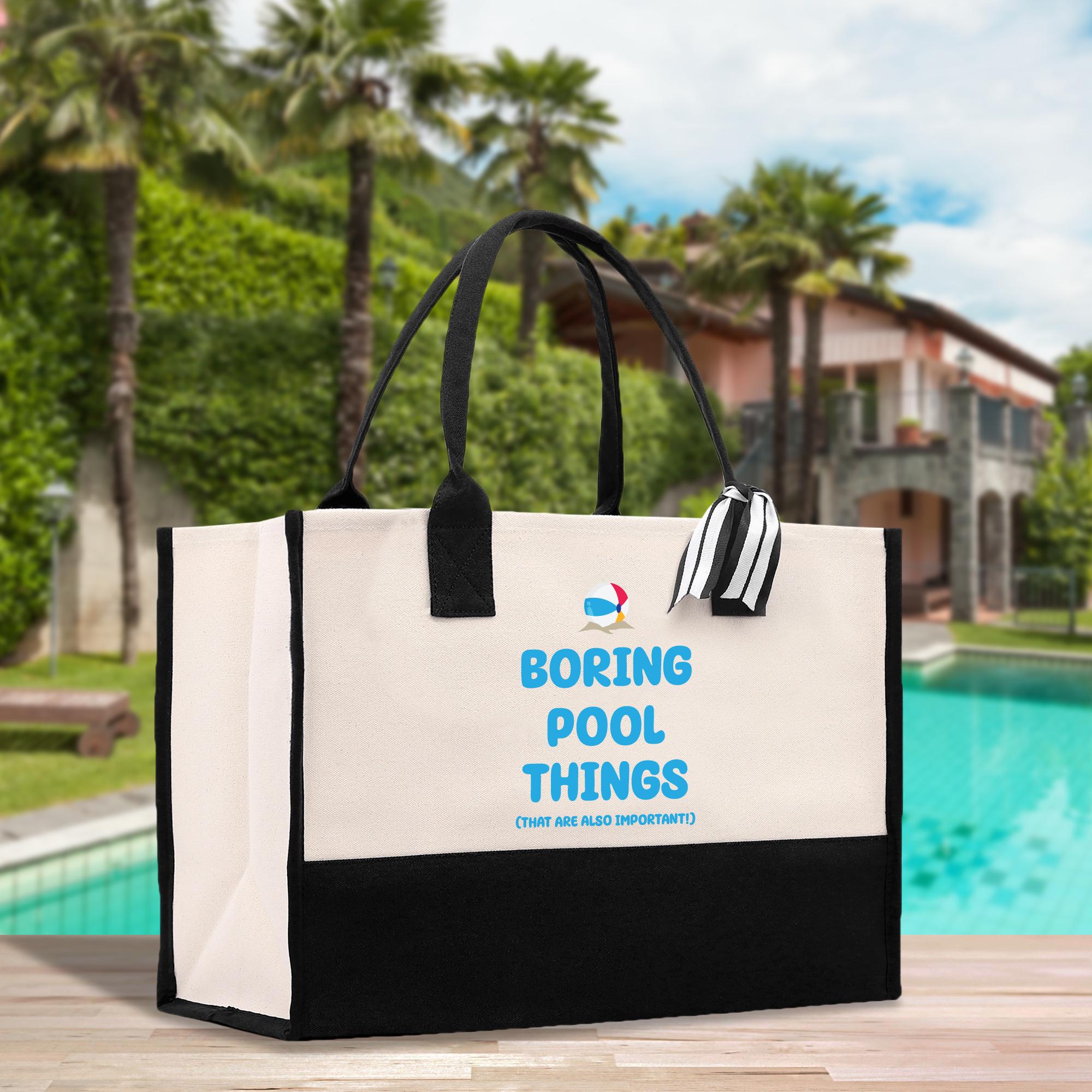 a white and black bag sitting on top of a wooden table