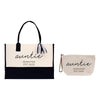 a black and white tote bag and a small beige pouch with the name "Auntie" printed on them.