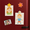 a red refrigerator door with various magnets and photos attached to it. There are two drawings of children, one of a girl and one of a boy, as well as a flower magnet. Additionally, there is a photo of a group of people, which appears to be a family portrait.