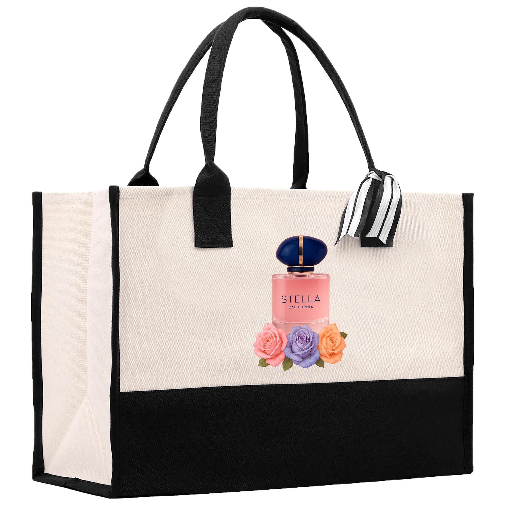 A large tote bag with a black and white color scheme, featuring a printed image of a perfume bottle and colorful flowers.
