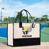 a black and white bag with a tennis racket on it