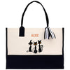 a black and white bag with two cats on it