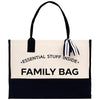 a white and black bag with a black handle