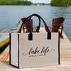 a lake life bag sitting on a dock