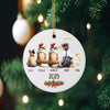 a christmas ornament hanging from a christmas tree