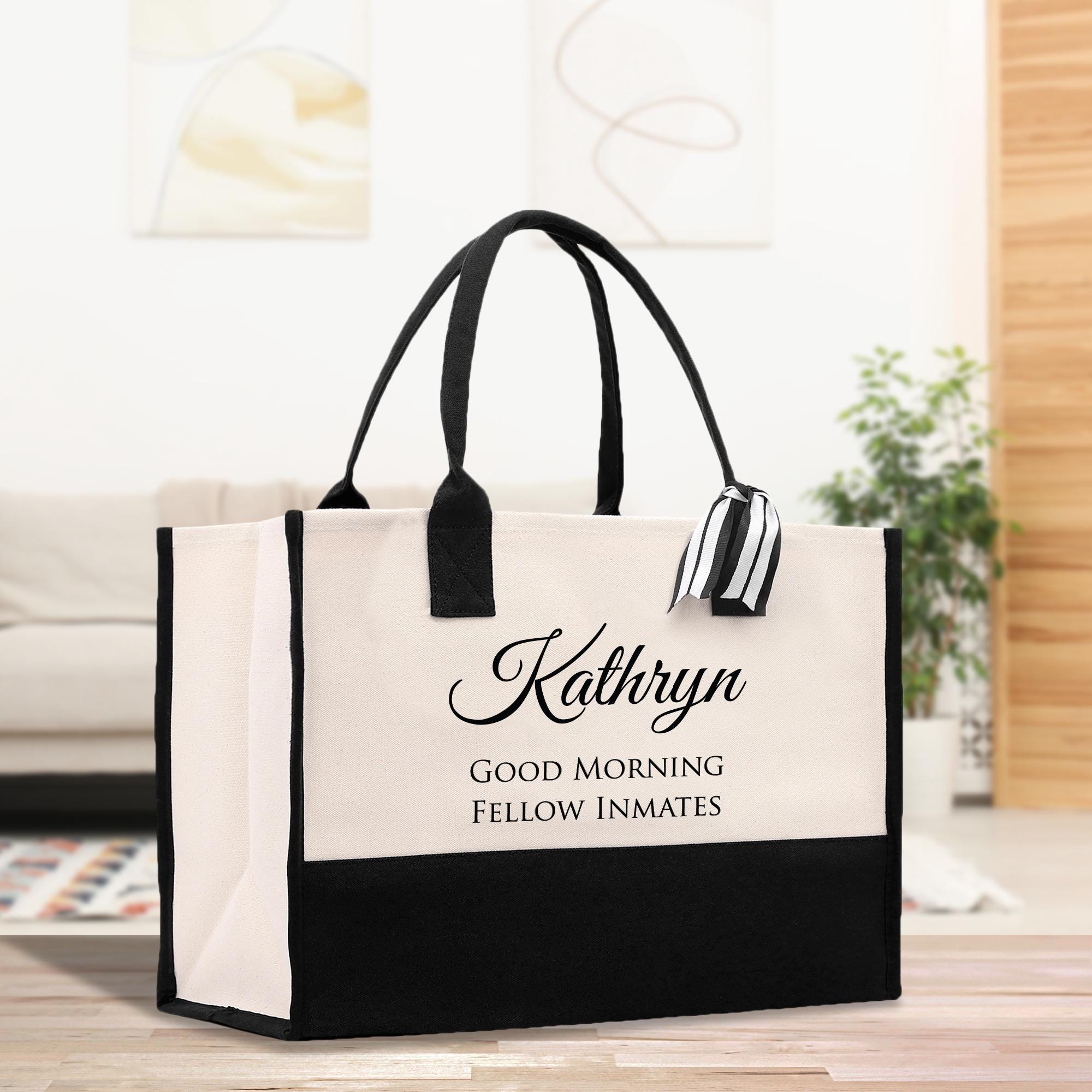 a black and white bag sitting on top of a table