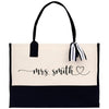 a black and white tote bag with the words mrs smith on it