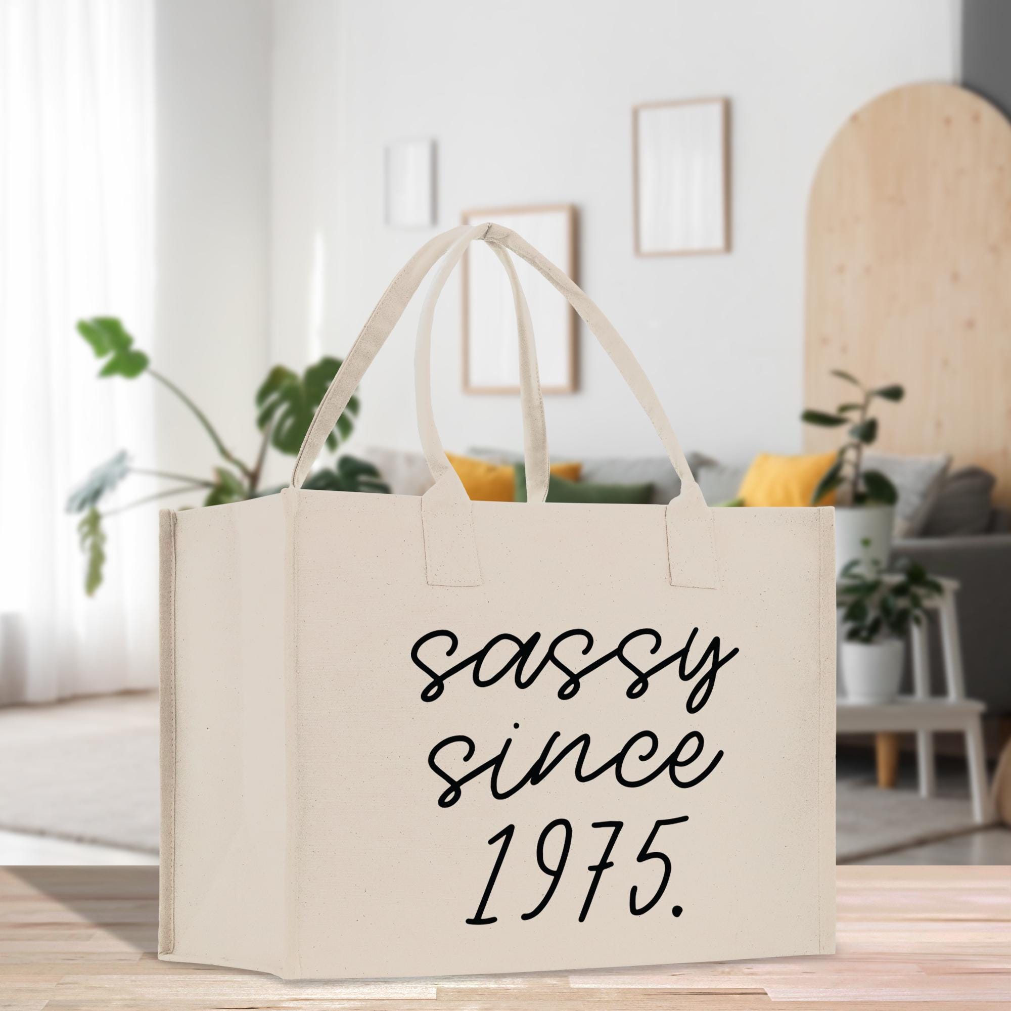 a canvas bag with the words sassy since 1915 printed on it