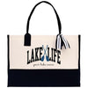 a white and black bag with lake life on it
