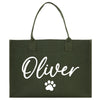 a green shopping bag with a dog's paw on it